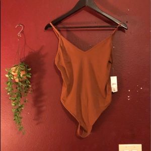 Rusted orange body suit!